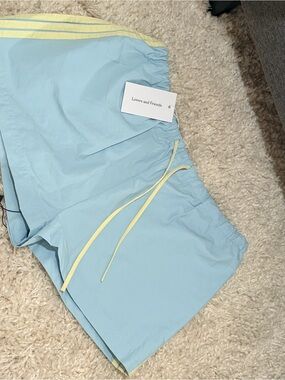 Lovers + Friends Pale Blue Athletic Shorts with Yellow Trim